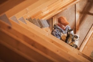 carpenter-carrying-tools-while-working-on-wooden